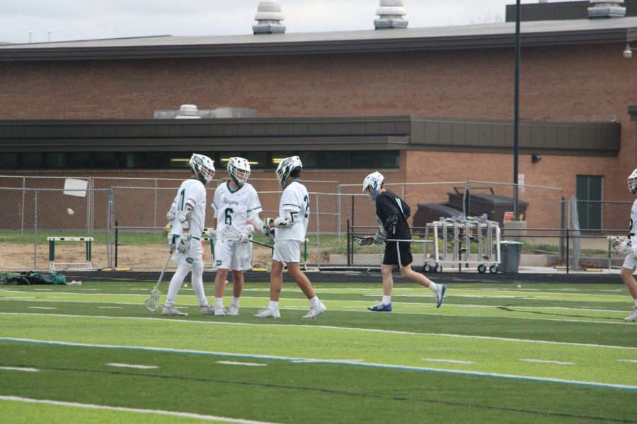 John+Tomsheck+scores+with+0.2+seconds+to+go+to+lift+boys+varsity+lacrosse+over+EGR+in+overtime+thriller