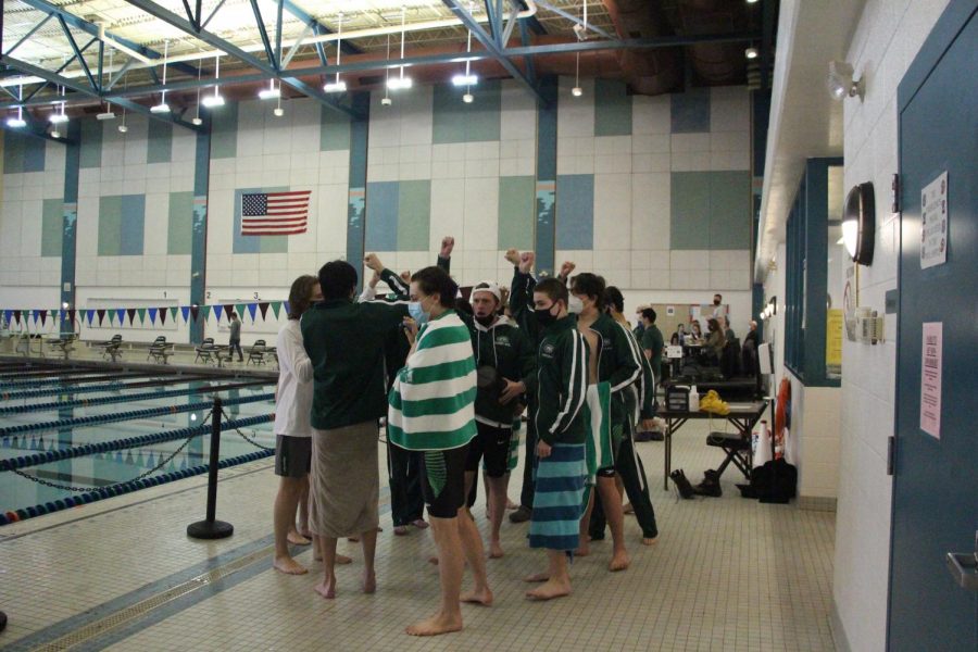 The boys varsity swim and dive team controls the pool in the first meet of the season
