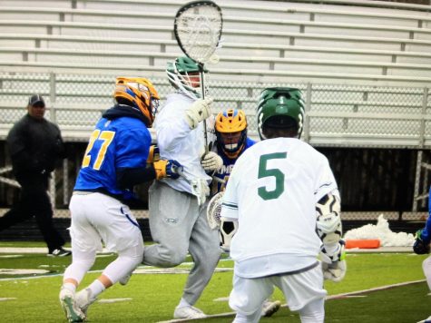 Boys varsity lacrosse handles GR Catholic Central 15-7 with widespread contributions