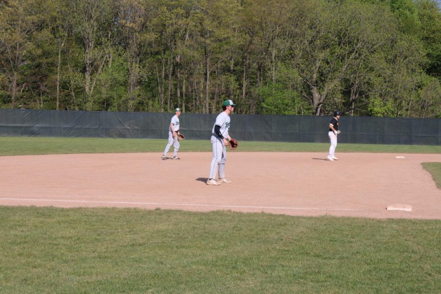 Varsity baseball splits double-header against Lowell on Monday night to set up a rubber match Wednesday