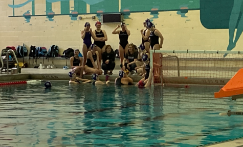 The girls varsity water polo team beats Grand Haven with only one more game until districts