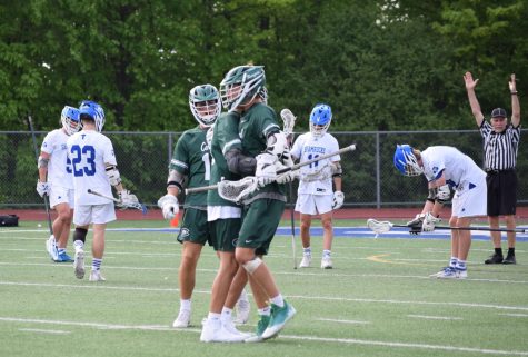 Boys lacrosse completes undefeated regular season in 9-6 win over Detroit Catholic Central