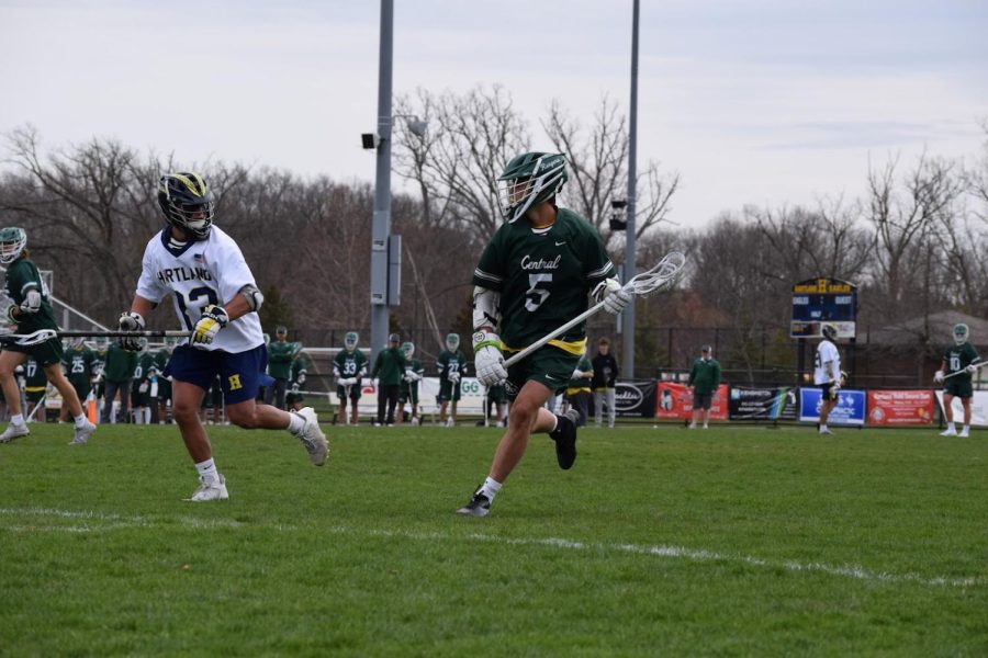 Boys varsity lacrosse remains undefeated following 10-8 thriller at Hartland