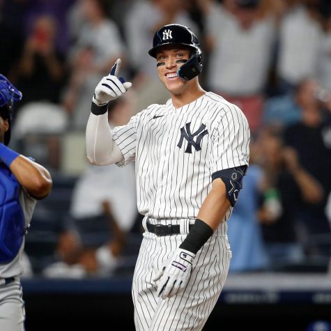 Aaron Judge leads the league with 54 home runs.