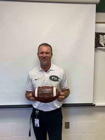 Freshman and JV football coach Anthony Sultini assigns his players a unique assignment every year