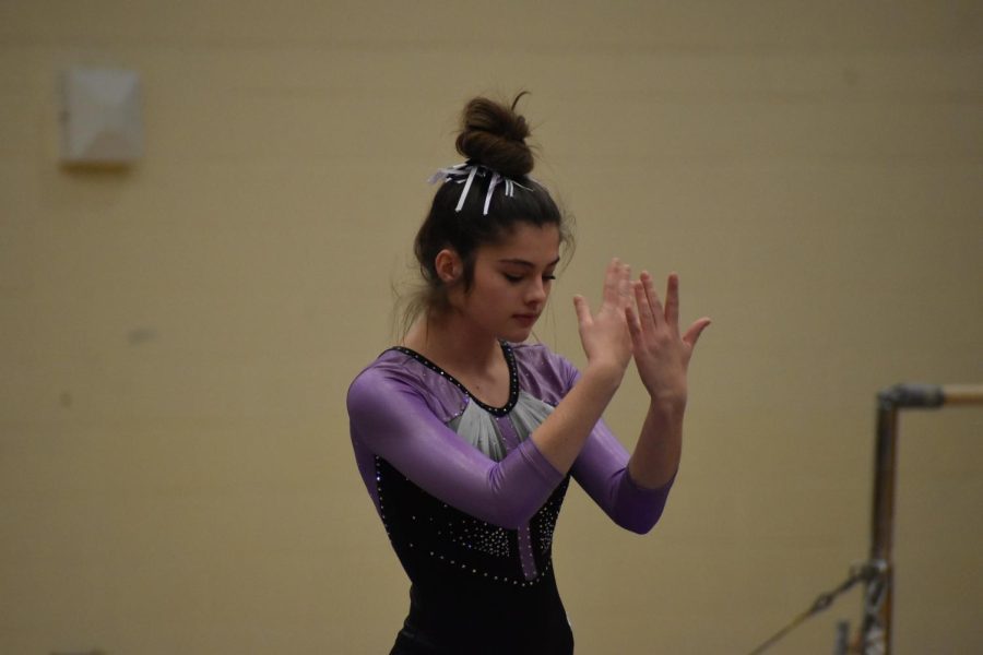 Lily Zorn shows her skills on beam.