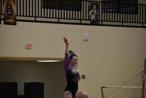 Charlotte Stephan performs her beam routine.