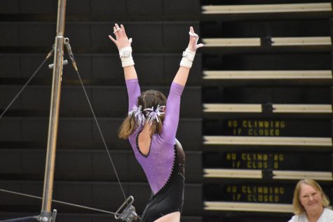 Lauren Wolffis saluting after her great performance on bars. 