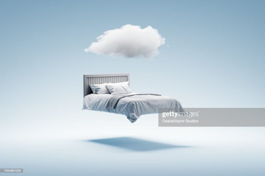 3D illustration of double bed hovering in air and with white cloud above. Blue toned computer graphics. Moody attitude.