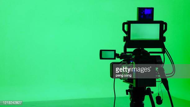Qingdao, Shandong, China -- June 5, 2020: green screen is like a virtual studio host or actor performing in front of a green background. Then people are separated from the background and other pictures are used as the background to fill in the green part, forming a seamless composite picture, which is widely used in film and TV production