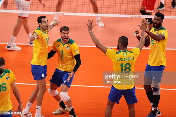 TOKYO, JAPAN - JULY 24: Team Brazil celebrates against Team Tunisia during the Mens Preliminary Round - Pool B on day one of the Tokyo 2020 Olympic Games at Ariake Arena on July 24, 2021 in Tokyo, Japan. (Photo by Toru Hanai/Getty Images)