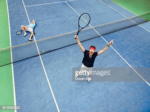 Man winning a tennis match