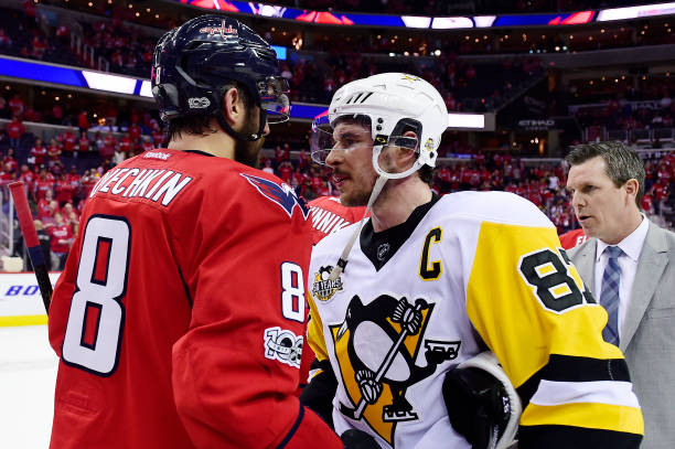 WASHINGTON, DC - MAY 10: Alex Ovechkin #8 of the Washington Capitals and Sidney Crosby #87 of the Pittsburgh Penguins shake hands after the Penguins defeated the Capitals 2-0 in Game Seven of the Eastern Conference Second Round during the 2017 NHL Stanley Cup Playoffs at Verizon Center on May 10, 2017 in Washington, DC. (Photo by Patrick McDermott/NHLI via Getty Images)