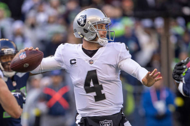 Las Vegas Raiders quarterback Derek Carr (4) prepares to throw during the first half  against the Seattle Seahawks at Lumen Field on Sunday, Nov. 27, 2022, in Seattle. (Heidi Fang/Las Vegas Review-Journal/Tribune News Service via Getty Images)