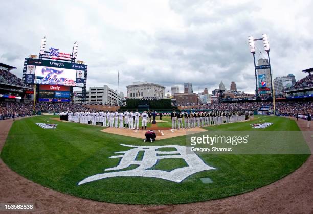 DETROIT, MI - OCTOBER 06:  The Detroit Tigers and the Oakland Athletics line up on the baselines for the performance of the National Anthem and pregame festivities during Game One of the American League Divisional Series at Comerica Park on October 6, 2012 in Detroit, Michigan.  (Photo by Gregory Shamus/Getty Images)