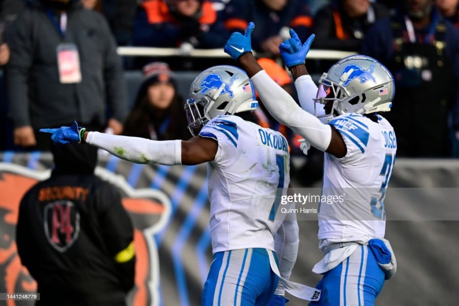 CHICAGO, ILLINOIS - NOVEMBER 13: Jeff Okudah #1 of the Detroit Lions and Kerby Joseph #31 of the Detroit Lions celebrates after Okudahs interception return for a touchdown during the fourth quarter against the Chicago Bears at Soldier Field on November 13, 2022 in Chicago, Illinois. (Photo by Quinn Harris/Getty Images)