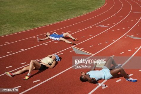 Exhausted runners on track