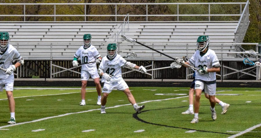 The+Ranger+defense+stands+ready+to+pounce+on+the+attackmen.