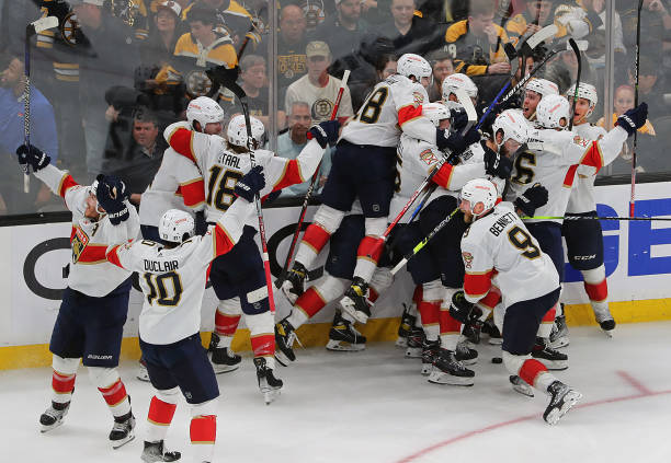 Boston, MA - April 30: Florida Panthers players celebrate their overtime win. The Panthers beat the Boston Bruins, 4-3, in Game 7 of their Eastern Conference First Round Series. (Photo by John Tlumacki/The Boston Globe via Getty Images)